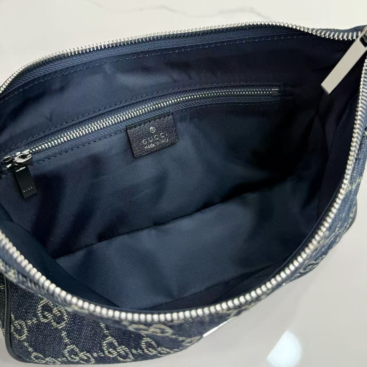 Dark blue washed GG denim