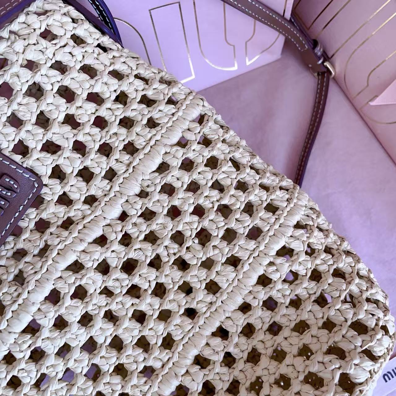 Miu summer pastoral holiday style, new woven hollow bucket bag