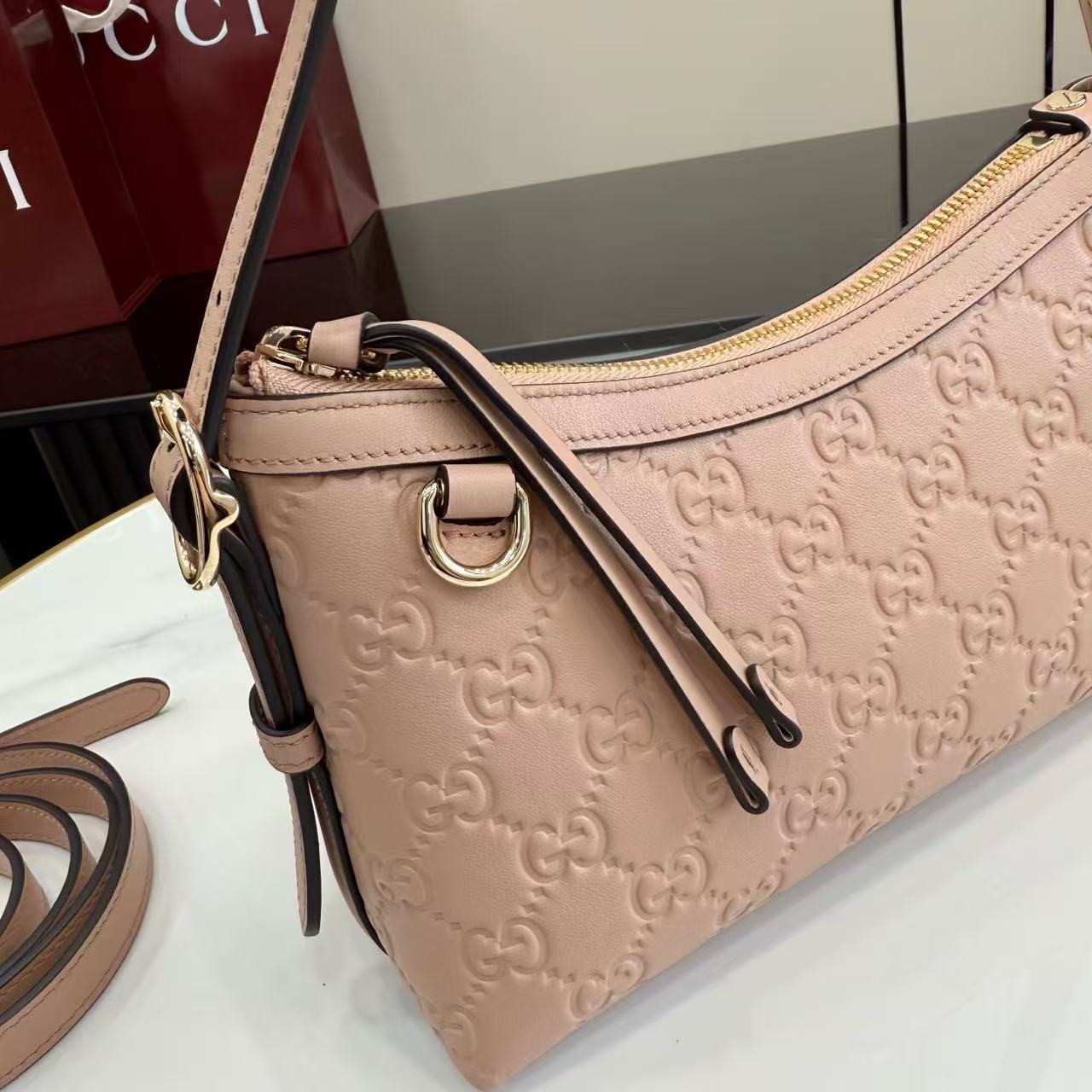 Apricot pink GG printed embossed cowhide