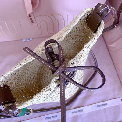 Miu summer pastoral holiday style, new woven hollow bucket bag