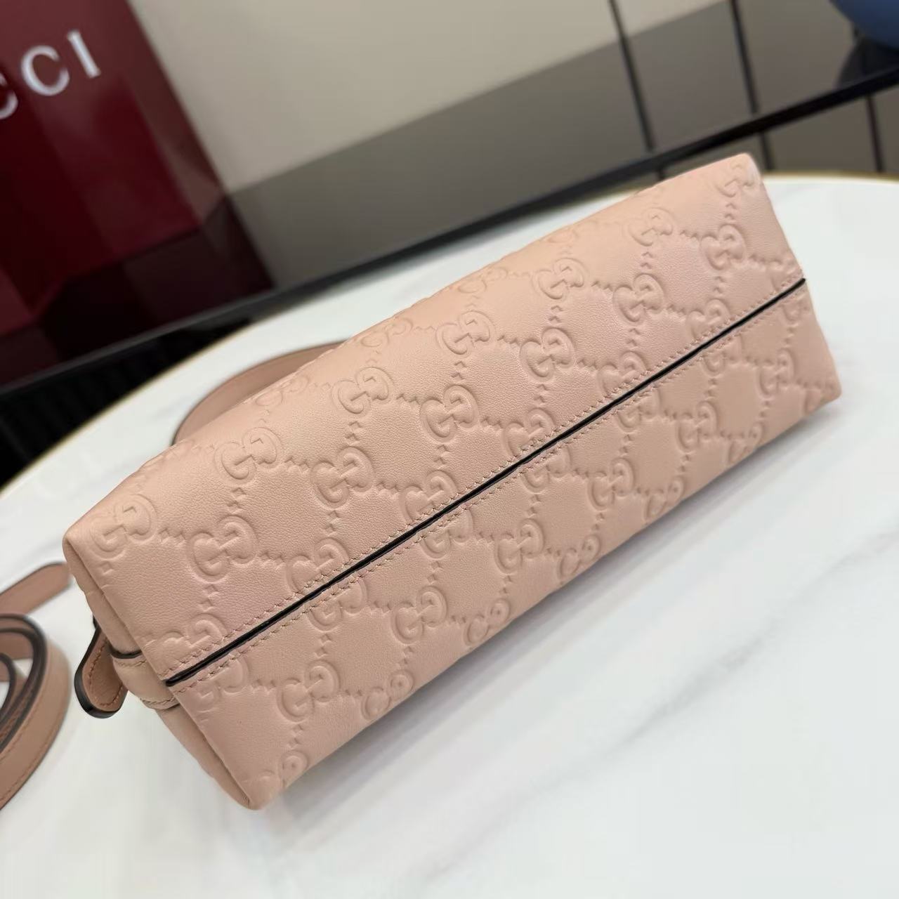 Apricot pink GG printed embossed cowhide