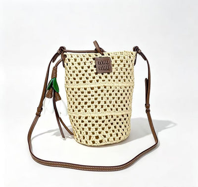 Miu summer pastoral holiday style, new woven hollow bucket bag