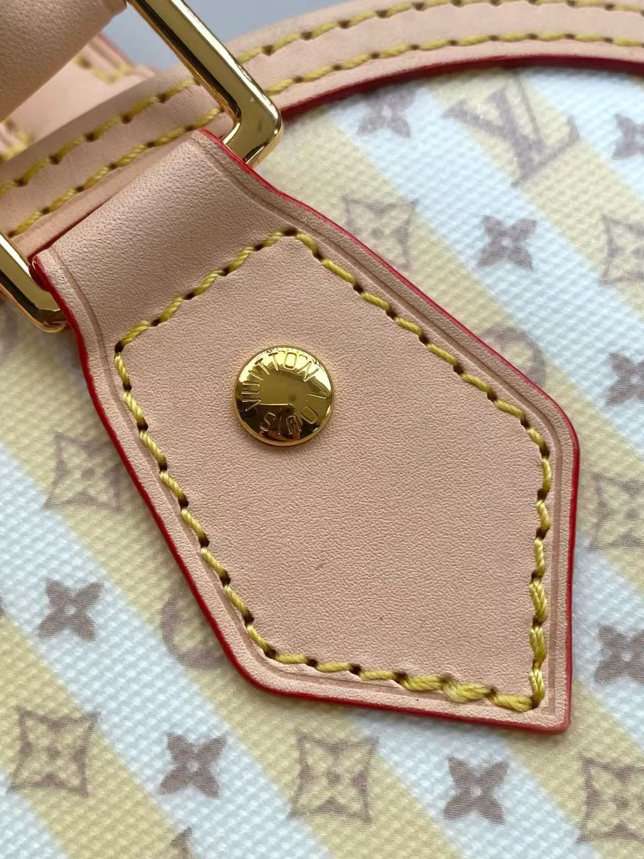 This LV Stamp series Alma BB handbag