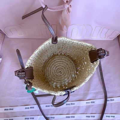 Miu summer pastoral holiday style, new woven hollow bucket bag