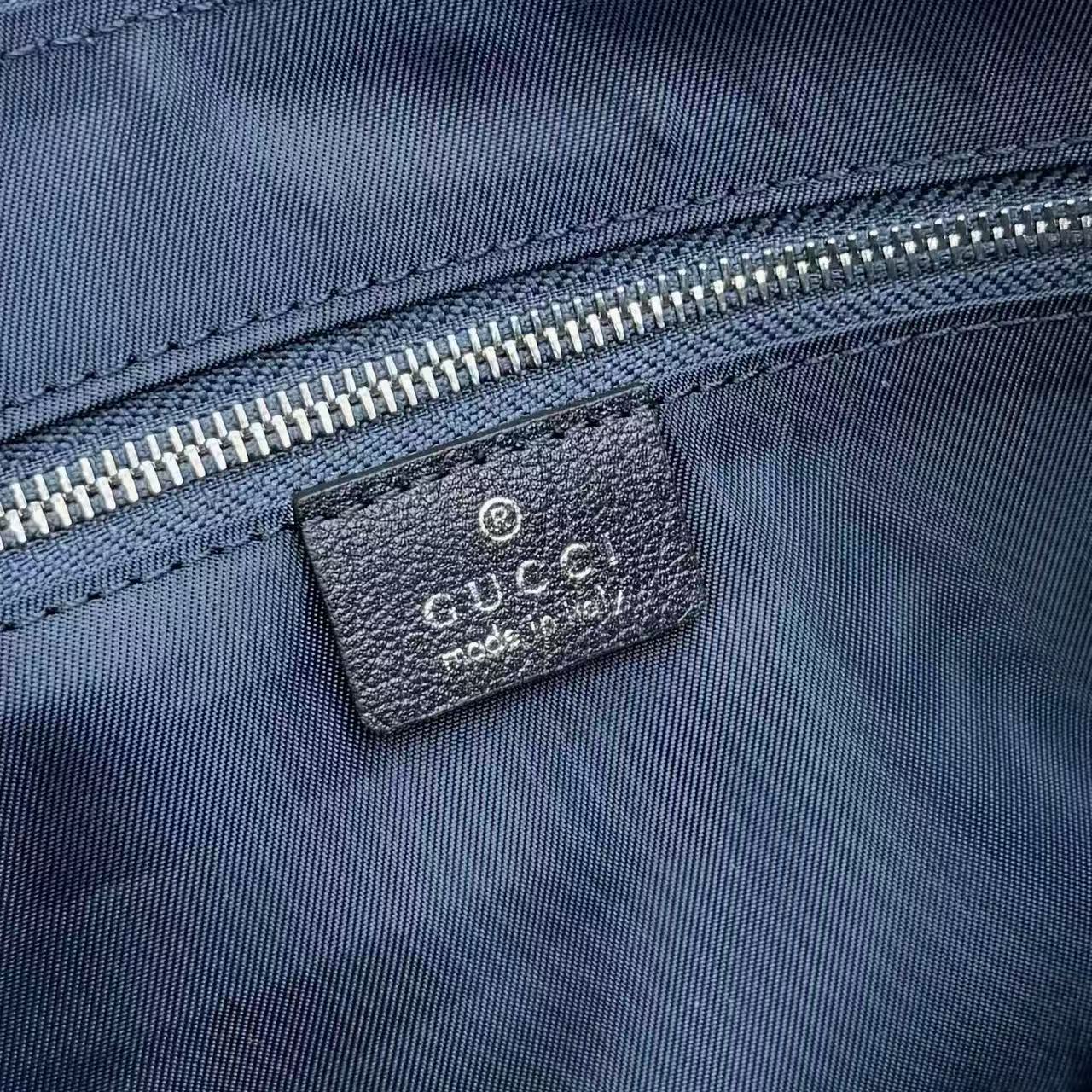 Dark blue washed GG denim