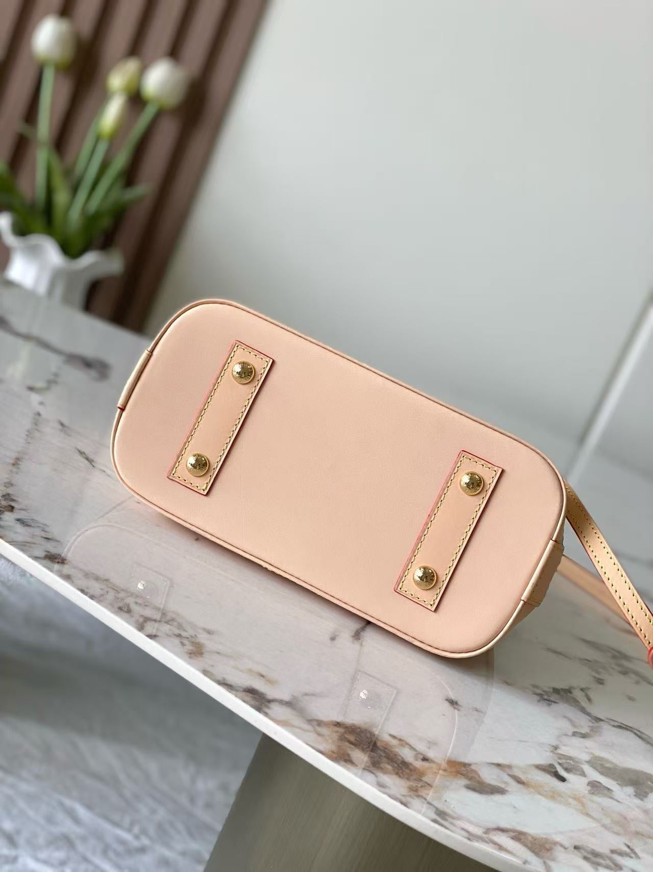 This LV Stamp series Alma BB handbag