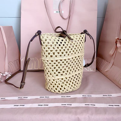 Miu summer pastoral holiday style, new woven hollow bucket bag